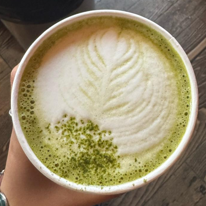 Photo of white chocolate pistachio matcha latte from Sawada Coffee