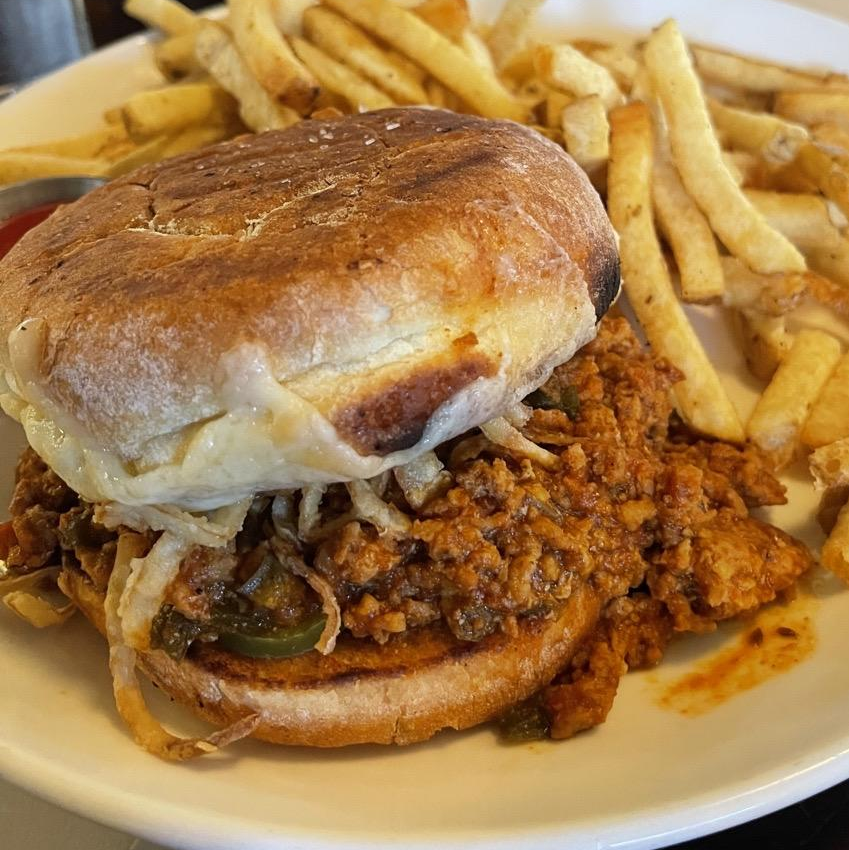 Photo of Wild Boar Sloppy Joe, Aged Cheddar, Pickled Jalapeno, Crispy Onions, Potato Roll from Longman & Eagle
