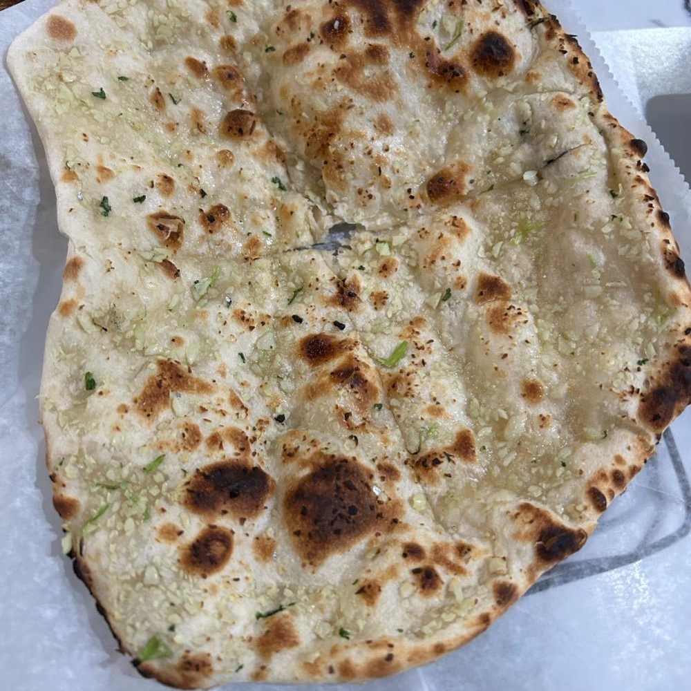 Photo of Garlic naan from Masala Square Indian Kitchen