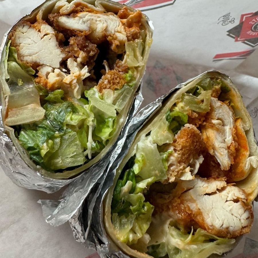 Photo of Cesar salad wrap + buffalo crispy chicken from Billy's Sub Shop