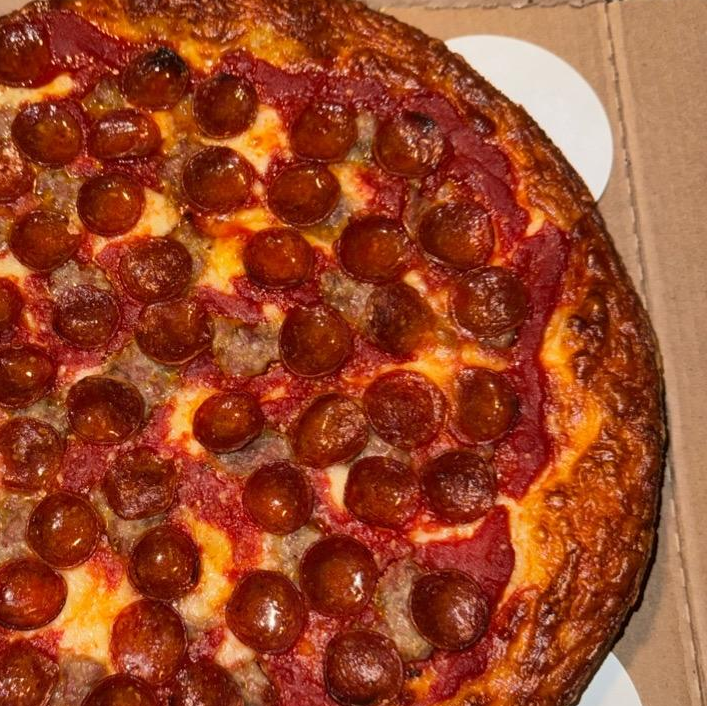 Photo of Pepperoini and sausage pizza from George’s Deep Dish