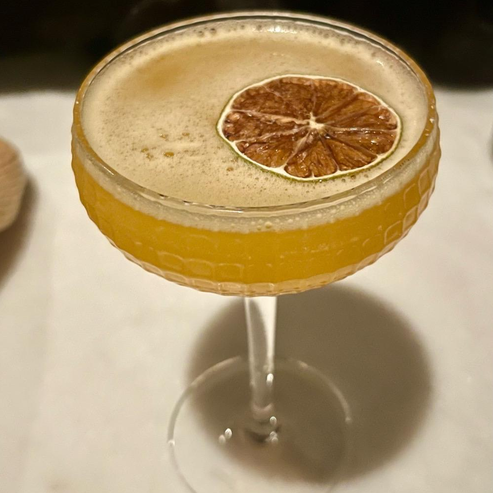 Photo of Passionfruit, aperol, brown sugar, and vodka from Blind Duck
